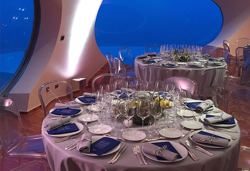 Table laid out for an indoor dinner party at the Palais Bulles